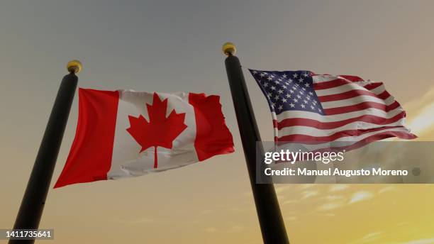 flag of canada and of the united states of america - canadians celebrate national day of independence stock pictures, royalty-free photos & images