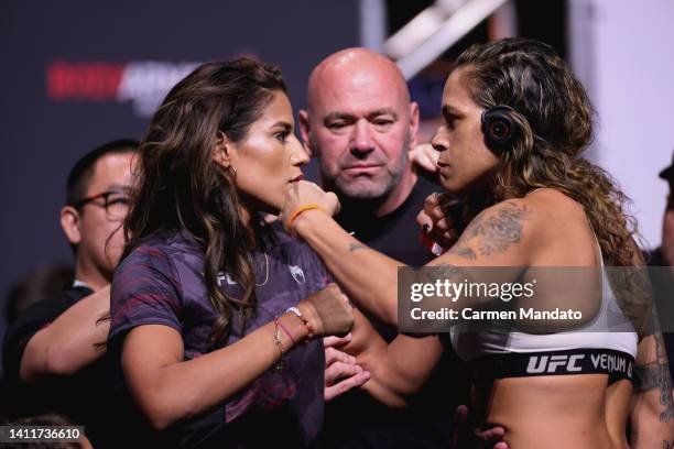 Julianna Pena and Amanda Nunes of Brazil face off during the UFC 277 ceremonial weigh-in at American Airlines Center on July 29, 2022 in Dallas,...