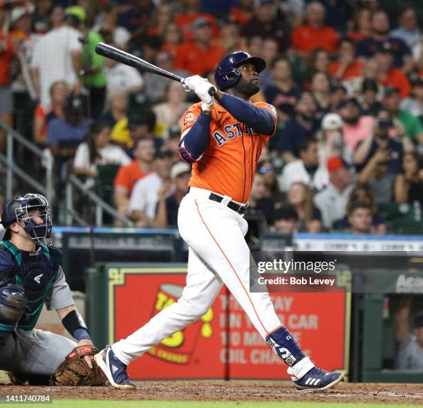 Yordan Alvarez of the Houston Astros hits a home run in the sixth inning against the Seattle Mariners at Minute Maid Park on July 29, 2022 in...