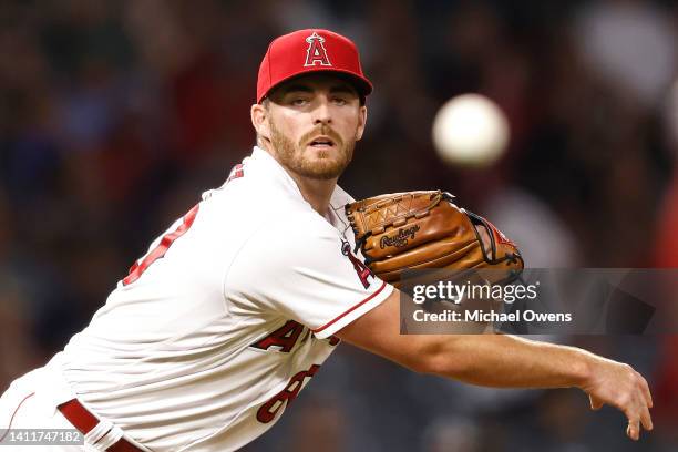 Andrew Wantz of the Los Angeles Angels makes a throw to first base against the Texas Rangers during the seventh inning at Angel Stadium of Anaheim on...