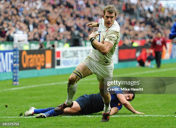 Tom Croft of England goes over to score his try during the RBS 6 Nations match between France and England at Stade de France on March 11, 2012 in...