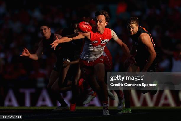 Ryan Clarke of the Swans chases the ball during the round 20 AFL match between the Sydney Swans and the Greater Western Sydney Giants at Sydney...