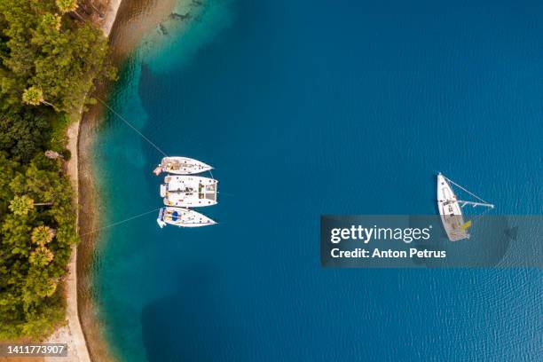 aerial view of yachts in a beautiful bay. yachting in croatia - croatia cruise stock pictures, royalty-free photos & images