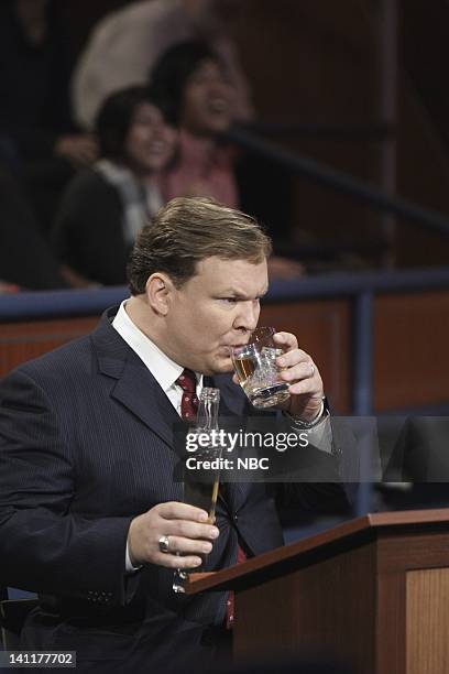 Air Date -- Episode 8 -- Pictured: Co-host Andy Richter tastes bacon flavored Vodka during a skit on June 10, 2009 -- Photo by: Paul Drinkwater/NBCU...