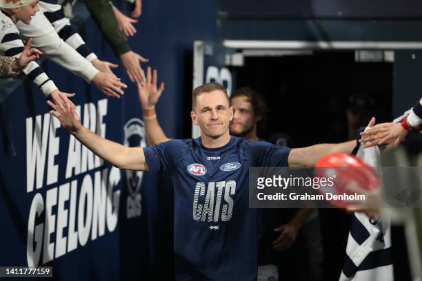Joel Selwood of the Cats walks out to warm up prior to the round 20 AFL match between the Geelong Cats and the Western Bulldogs at GMHBA Stadium on...