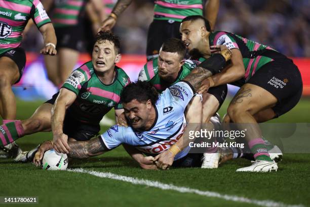 Andrew Fifita of the Sharks scores a try during the round 20 NRL match between the Cronulla Sharks and the South Sydney Rabbitohs at PointsBet...