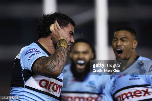 Andrew Fifita of the Sharks celebrates scoring a try during the round 20 NRL match between the Cronulla Sharks and the South Sydney Rabbitohs at...