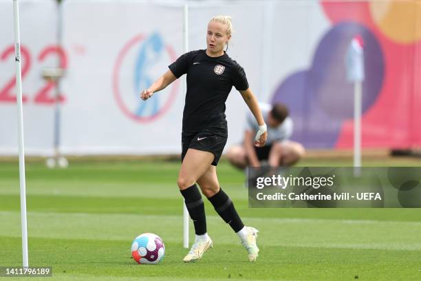 Beth Mead of England runs with the ball during the UEFA Women's Euro England training session at The Lensbury on July 30, 2022 in London, England.