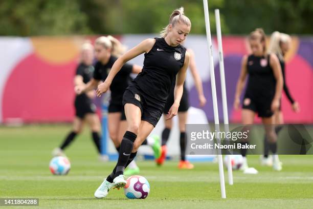 Leah Williamson of England runs with the ball during the UEFA Women's Euro England training session at The Lensbury on July 30, 2022 in London,...