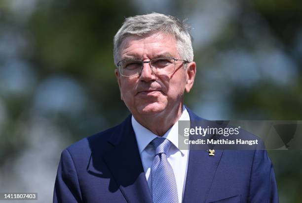 International Olympic Committee IOC President Thomas Bach attends a medal ceremony at day four of the 2022 ICF Canoe Slalom World Championships on...