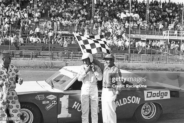 Ernie Derr after scoring an International Motor Contest Association stock car win with his Dodge Charger. Derr won 19 of the 36 races on the IMCA...