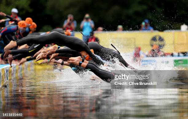 Athletes dive in to start the Women's Individual Sprint Distance Triathlon Final on day one of the Birmingham 2022 Commonwealth Games at Sutton Park...