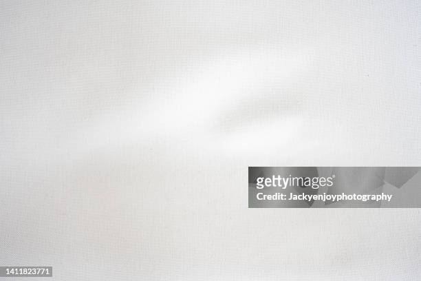 white silk fabric background - blitzlicht stock-fotos und bilder