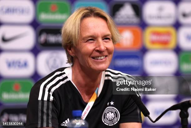 Martina Voss-Tecklenburg, Head Coach of Germany speaks to the media during the UEFA Women's Euro England Germany press conference and training...