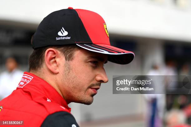 Third placed qualifier Charles Leclerc of Monaco and Ferrari looks on in parc ferme during qualifying ahead of the F1 Grand Prix of Hungary at...