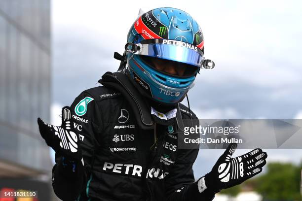 Pole position qualifier George Russell of Great Britain and Mercedes celebrates in parc ferme during qualifying ahead of the F1 Grand Prix of Hungary...