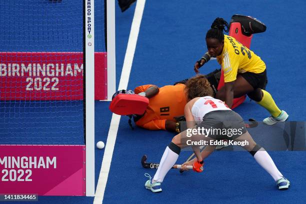 Holly Hunt of Team England scores their sides fifth goal during the Women's Hockey - Pool A match between England and Ghana on day two of the...