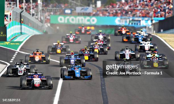 Enzo Fittipaldi of Brazil and Charouz Racing System leads the field into turn one at the start during the Round 10:Budapest Sprint race of the...