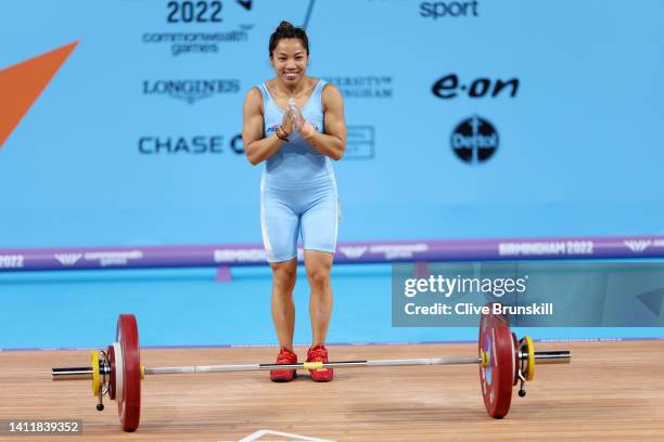 Chanu Saikhom Mirabai of Team India reacts after performing a snatch during the Women's Weightlifting 49kg Final on day two of the Birmingham 2022...