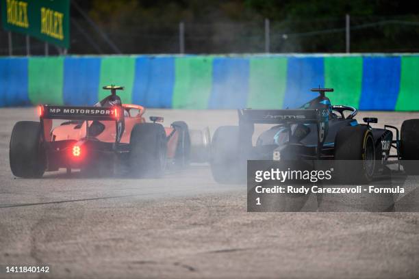 Roy Nissany of Israel and DAMS and Clement Novalak of France and MP Motorsport run wide during the Round 10:Budapest Sprint race of the Formula 2...