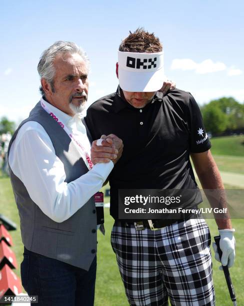 Ian Poulter of Majesticks GC talks with broadcaster David Feherty during day two of the LIV Golf Invitational - Bedminster at Trump National Golf...