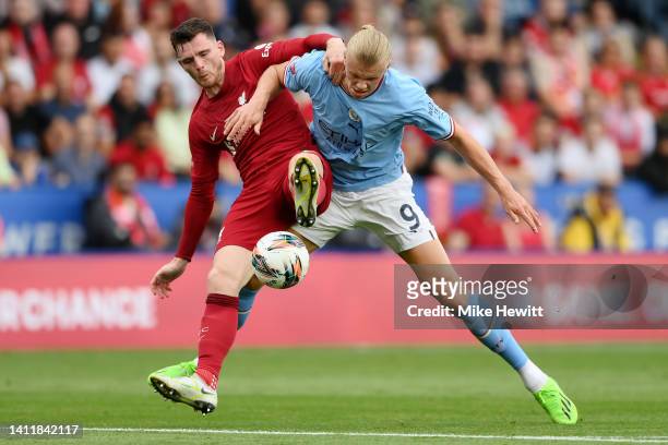 Andy Robertson of Liverpool challenges Erling Haaland of Manchester City during The FA Community Shield between Manchester City and Liverpool FC at...