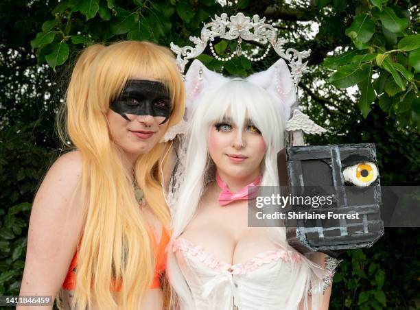 Cosplayers dressed as Katsuki Bakugo and Mangle attend Manchester Comic Con at Bowlers Exhibition Centre on July 30, 2022 in Manchester, England.