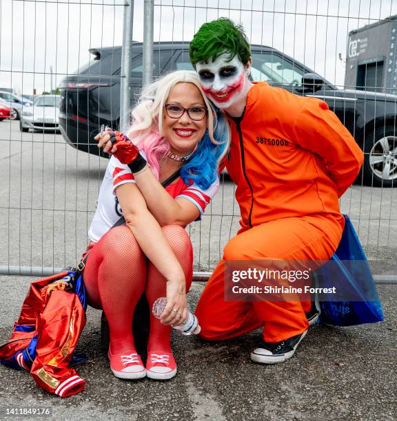 Cosplayers dressed as Harley Quinn and The Joker attend Manchester Comic Con at Bowlers Exhibition Centre on July 30, 2022 in Manchester, England.