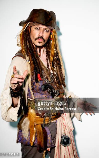 Cosplayer dressed as Captain Jack Sparrow attends Manchester Comic Con at Bowlers Exhibition Centre on July 30, 2022 in Manchester, England.