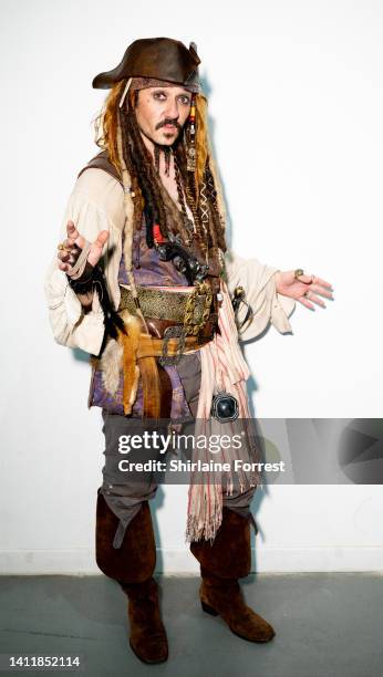 Cosplayer dressed as Captain Jack Sparrow attends Manchester Comic Con at Bowlers Exhibition Centre on July 30, 2022 in Manchester, England.