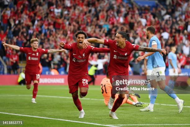 Darwin Nunez of Liverpool celebrates scoring their side's third goal with teammate Fabio Carvalho during The FA Community Shield between Manchester...