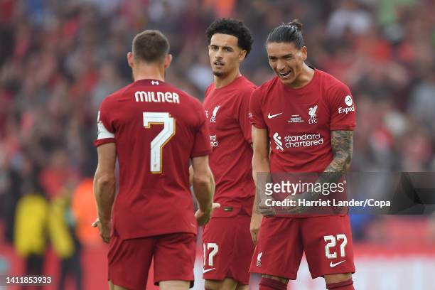 Darwin Nunez of Liverpool and James Milner of Liverpool celebrate following their team's victory in the FA Community Shield between Manchester City...