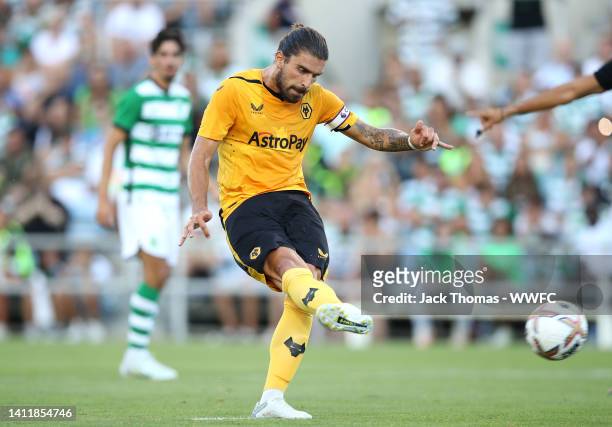 Ruben Neves of Wolverhampton Wanderers scores their side's first goal from a penalty during the pre-season match between Wolverhampton Wanderers and...