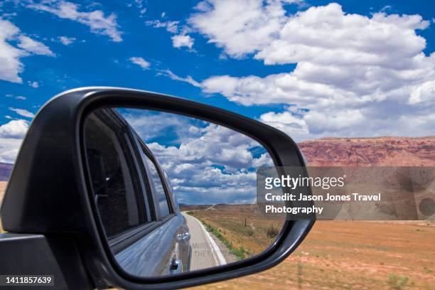reflections of a blue sky in a car mirror in utah - car side view mirror stock pictures, royalty-free photos & images
