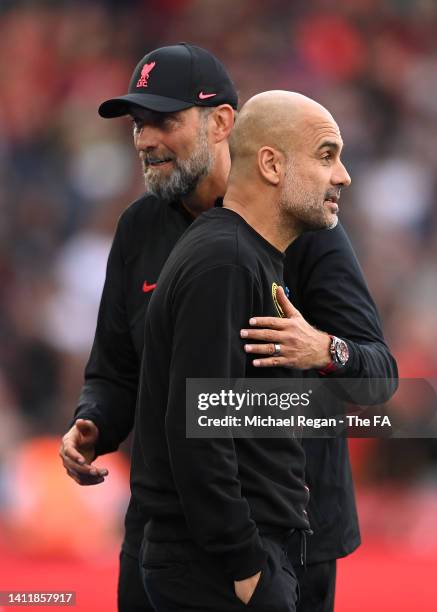 Jürgen Klopp head coach of Liverpool talks to Pep Guardiola head coach of Manchester City talk after The FA Community Shield between Manchester City...