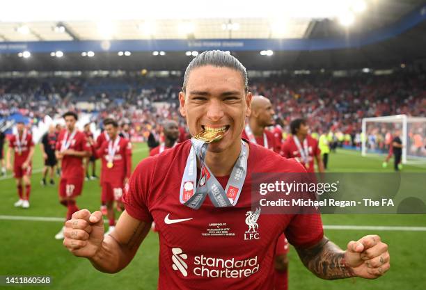 Darwin Nunez of Liverpool celebrates as they bite their winners medal after the final whistle of The FA Community Shield between Manchester City and...