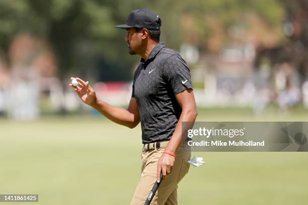 Tony Finau of the United States reacts after making birdie on the third green during the third round of the Rocket Mortgage Classic at Detroit Golf...