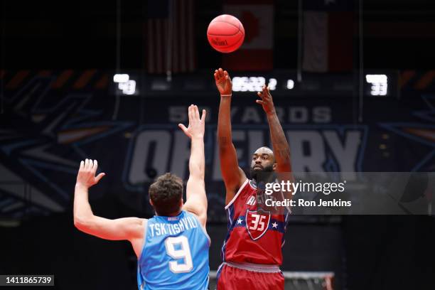 DaJuan Summers of the Tri-State shoots against Nikoloz Tskitishvili of the Power during BIG3 Week Seven at Comerica Center on July 30, 2022 in...