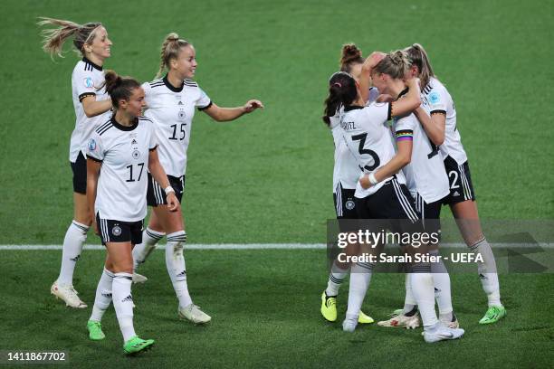 Alexandra Popp of Germany celebrates scoring their side's first goal with teammates during the UEFA Women's Euro 2022 Semi Final match between...