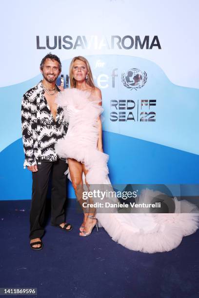 Simone Marchetti and Anna Dello Russo attend the photocall at the LuisaViaRoma for Unicef event at La Certosa di San Giacomo on July 30th in Capri,...