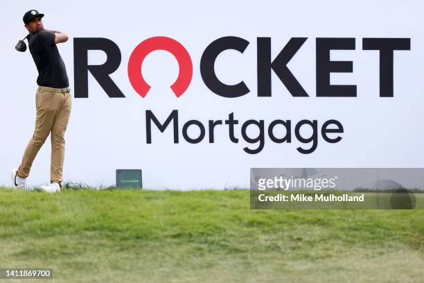 Tony Finau of the United States plays his shot from the seventh tee during the third round of the Rocket Mortgage Classic at Detroit Golf Club on...