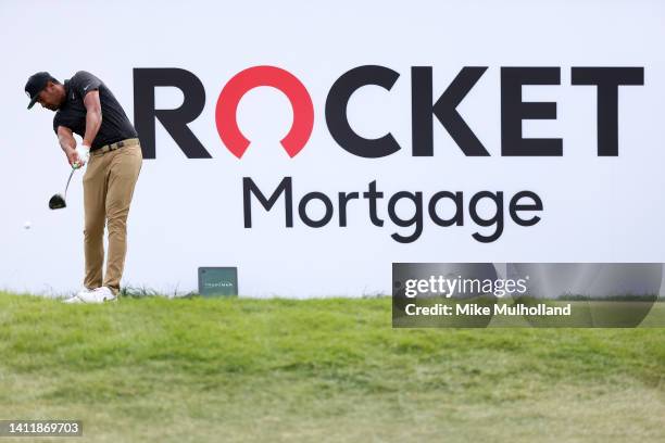 Tony Finau of the United States plays his shot from the seventh tee during the third round of the Rocket Mortgage Classic at Detroit Golf Club on...