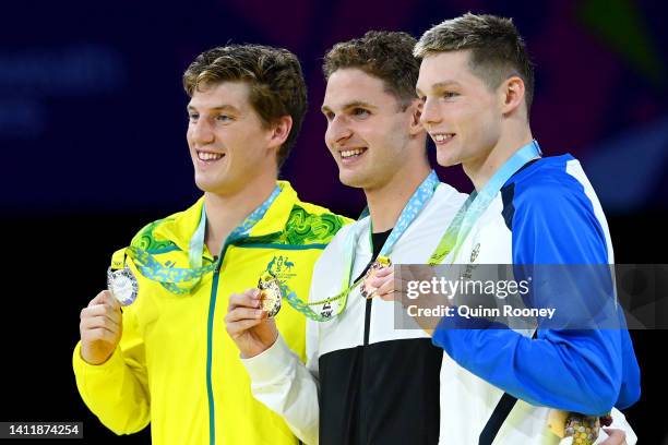 Silver medalist, Brendon Smith of Team Australia, Gold medalist, Lewis Clareburt of Team New Zealand and Bronze medalist, Duncan Scott of Team...
