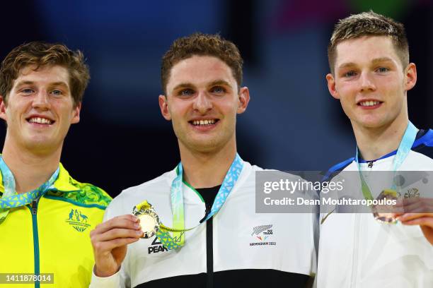 Silver medalist, Brendon Smith of Team Australia, Gold medalist, Lewis Clareburt of Team New Zealand and Bronze medalist, Duncan Scott of Team...