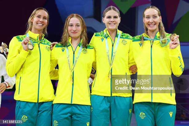 Gold medalists, Madison Wilson, Shayna Jack, Mollie O'Callaghan and Emma McKeon of Team Australia pose with their medals during the medal ceremony...