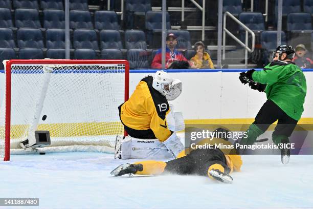 John Schiavo of Team Murphy scores a goal against Jacob Theut of Team Mullen during 3ICE Week Seven at Videotron Centre on July 30, 2022 in Quebec...