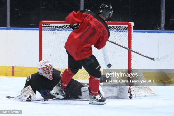 Samson Mahbod of Team Carbonneau scores a goal against Connor LaCouvee of Team LeClair in the semifinal game during 3ICE Week Seven at Videotron...