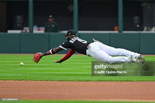 Josh Harrison of the Chicago White Sox dives in an attempt to field the baseball in the first inning against the Oakland Athletics at Guaranteed Rate...