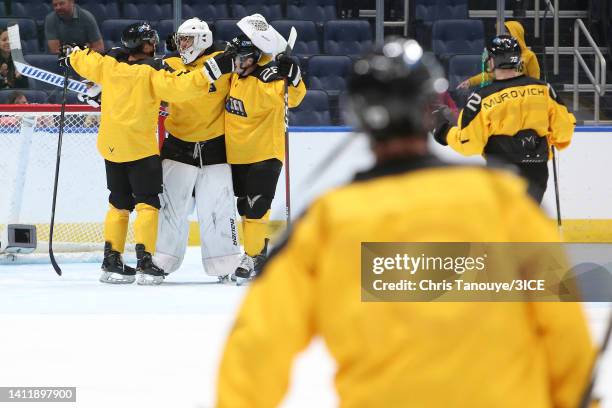 Jacob Theut of Team Mullen celebrates with teammates after defeating Team Carbonneau 5-2 in the final during 3ICE Week Seven at Videotron Centre on...