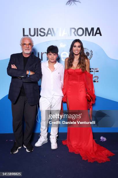 Flavio Briatore, Nathan Falco Briatore and Elisabetta Gregoraci attend the photocall at the LuisaViaRoma for Unicef event at La Certosa di San...
